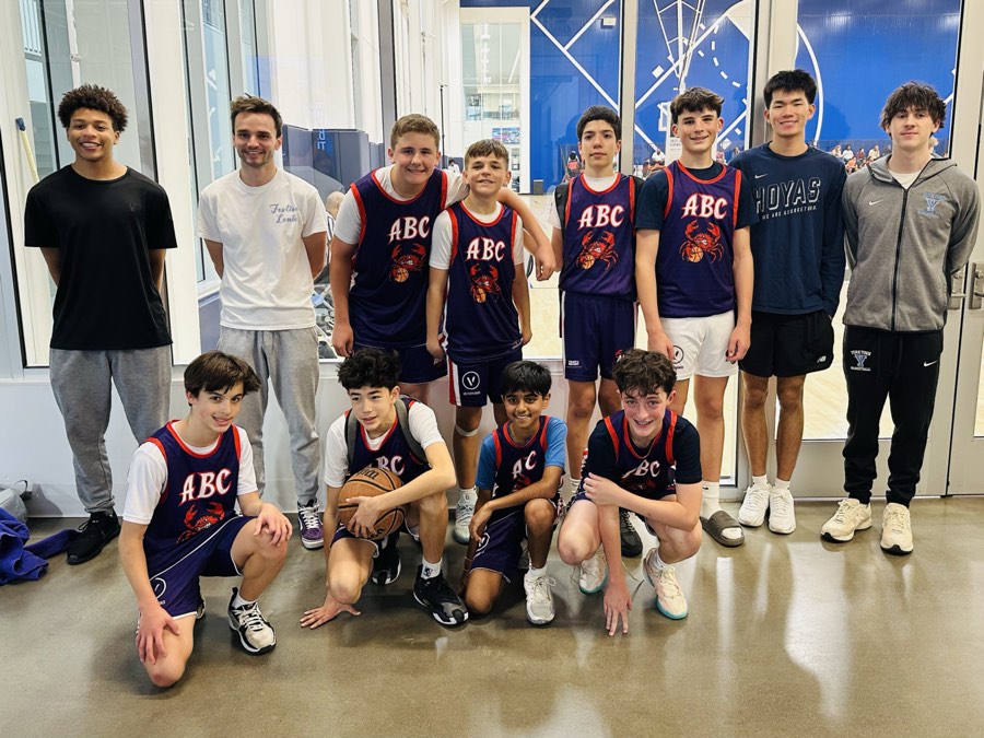 8th grade ABC team in navy jerseys